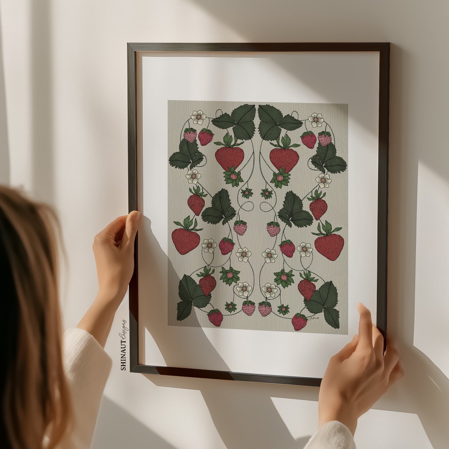 strawberry garden nouveau art print with woman holding frame