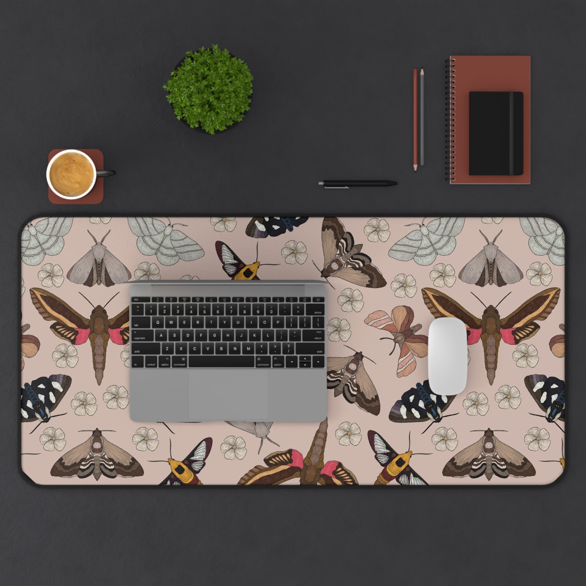 16x32" garden moths desk mat on desk