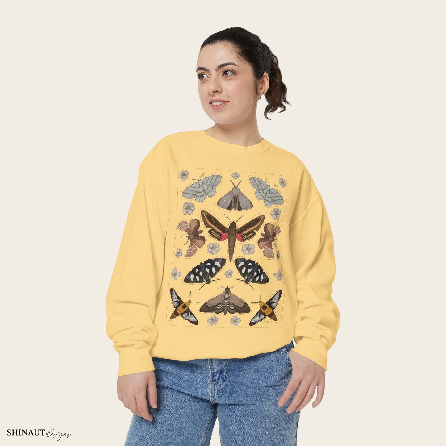 Garden moths crewneck in butter female model