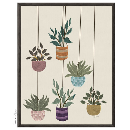 hanging plants art print in black picture frames