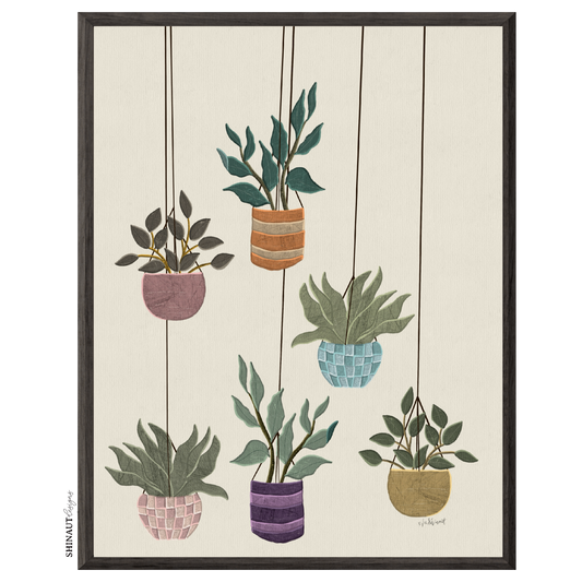 hanging plants art print in black picture frames