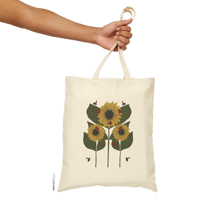 sunflower plant tote bag hand holding handle